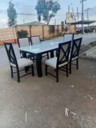 6-Seater White Marble-Finish Mahogany Dining Set with Black Stands